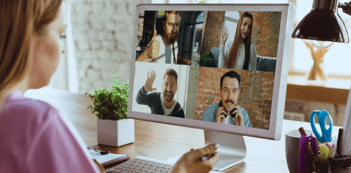 Remote worker in meeting with staff